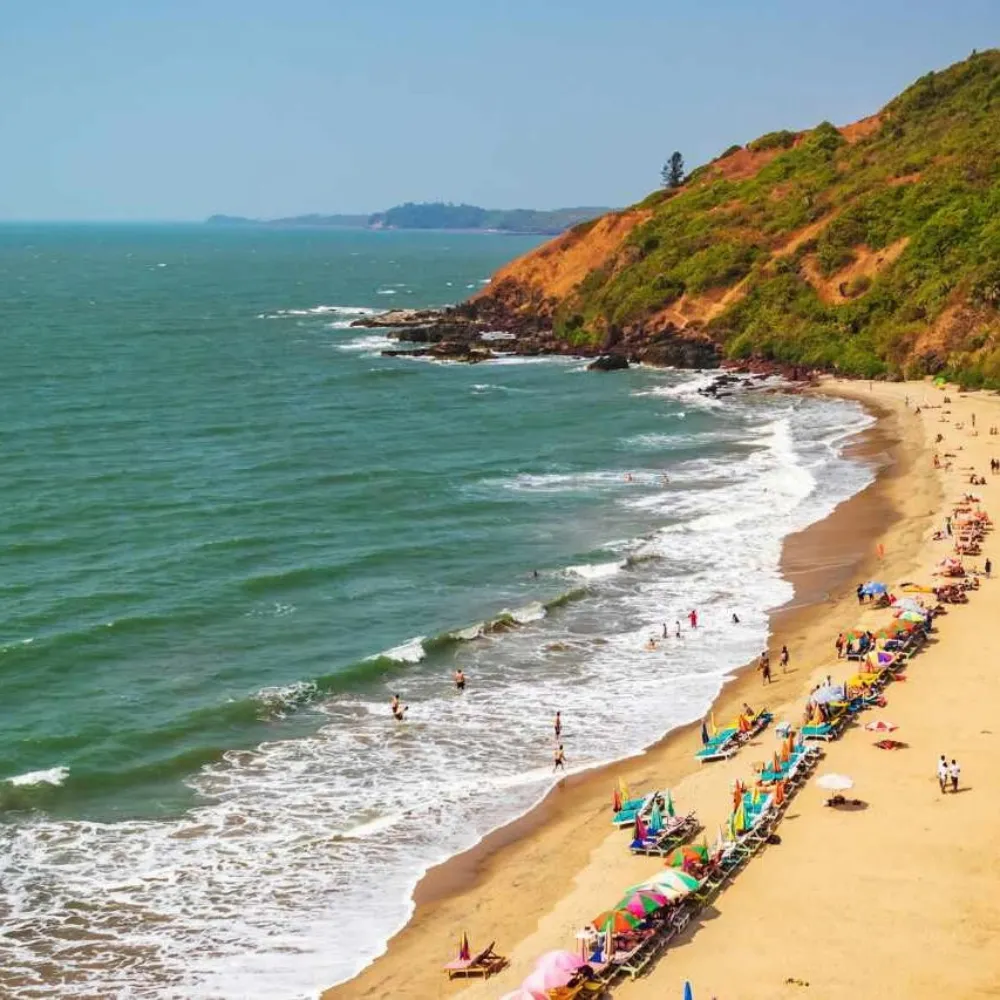 Coastal sunset and beach waters in Goa